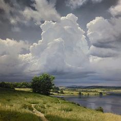 an oil painting of clouds over a lake and grassy field with trees in the foreground