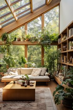 a living room filled with furniture and lots of plants