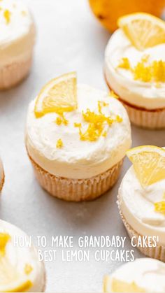 lemon cupcakes with white frosting and orange zest on the top one