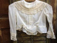 Victorian Lace Blouse For Daywear, Lace Top For Daywear, Vintage Lace Patchwork Blouse For Wedding, White Victorian Style Top With Lace Work, White Victorian Blouse With Lace Trim, Vintage White Blouse With Lace Trim For Daywear, Victorian Lace Work Blouse For Wedding, Victorian Lace Wedding Blouse, White Lace Blouse For Daywear