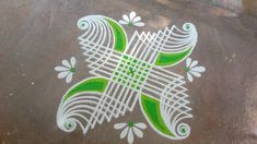 a white and green design painted on the ground