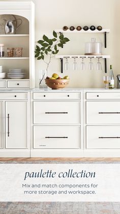 a kitchen with white cabinets and shelves filled with dishes