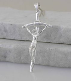 "Model # Metal: Sterling Silver Stamp or Hallmark: 925 Cross:Solid silver cross Length:2 3/8 inches (approx 60mm ) Width:1 2/8 inches ( approx 30mm) Complemenatry Chain: 20\" or 22\" Sterling Silver thin box Chain More Cross Necklaces Style: https://www.etsy.com/shop/theangelfaith?ref=hdr_shop_menu&search_query=cross+necklace * We only sell SOLID metals Stamp: 925 Sterling Silver. -We do NOT Silver plate our Jewelry- All jewelry comes in a gift box We will ship with in 1-3 business days by U Large Cross Necklace, Crucifix Necklace, Cross Necklaces, Silver Cross Necklace, Sterling Silver Cross Necklace, Necklace Sterling Silver, Silver Cross, Solid Metal, Box Chain