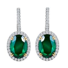 Hand made in the Emilio Jewelry Factory, 2 gorgeous deep green gem quality oval Zambian Emeralds totaling 7.69 Carats set in the center. The emeralds are very clean and completely eye clean. Center Emerald Dimensions: 12.00x9.00mm Earring dimension: 12.30mm wide x 31.75mm long The diamonds total .80ct and are E-F vvs1 clarity. A professional appraisal will be included. Includes Gemstone Report by C.Dunaigre, Switzerland. For your piece of mind we are a proud Top Selling dealer on 1stdibs, and yo Emilio Jewelry, Diamond Tops, Emerald Diamond Earrings, Green Gem, Platinum Earrings, Contemporary Earrings, Green Gems, Hanging Earrings, Emerald Earrings