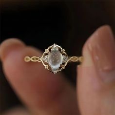 Baroque-style Moonstone Ring - ArtGalleryZen Jade Diamond Engagement Ring, Vintage Gold Moonstone Ring, Titanic Accessories, Weird Engagement Rings, Non Traditional Wedding Rings, Unique Engagement Rings Vintage, Magical Rings, Stone Wedding Rings, خواتم خطوبة