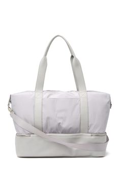 Stay stylish when traveling. The roomy interior of this Madden Girl weekend bag fits some of your favorite outfits and toiletries. - Dual top handles- Detachable, adjustable shoulder strap- Top zip closure- Exterior features slip pockets and bottom zip pocket- Interior features media pockets and zip wall pocket- Approx. 11" H x 19" W x 9.5" D- Approx. 12" handle drop, 19-30" strap drop - Imported Textile exterior and lining Weekend Duffle Bag, Weekend Bag, Girls Weekend, Strap Top, Madden Girl, Strap Tops, Weekender Bag, Duffel Bag, Nordstrom Rack