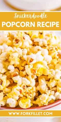 a bowl filled with popcorn on top of a table