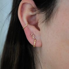 The Tiny Letter Stud is a perfect addition to any ear stack. 14k Yellow Gold, 14k White Gold, or 14k Rose Gold 1/4" Sold individually Dainty Stackable 14k Gold Earrings, Dainty 14k Gold Stackable Earrings, Dainty Stackable Earrings For Anniversary, Dainty 14k Gold Huggie Jewelry, 14k Gold Dainty Huggie Jewelry, 14k Gold Stackable Huggie Earrings As A Gift, Stackable 14k Gold Huggie Earrings For Anniversary, Stackable Huggie Earrings Fine Jewelry For Gift, Stackable Huggie Earrings As Gift In Fine Jewelry