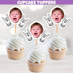 three cupcake toppers with fingers on them