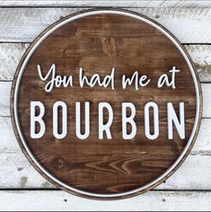 you had me at bourbon sign on wooden planks with the words, you had me at bourbon