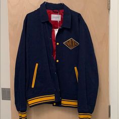 Tags Still On! Ovadia Monogrammed Varsity Jacket In Navy And Gold. Yellow Varsity Winter Outerwear, Yellow Varsity Outerwear For Winter, Yellow Varsity Long Sleeve Outerwear, Yellow Long Sleeve Varsity Outerwear, Yellow Varsity Outerwear For College, Blue Yellow, Varsity Jacket, Mens Jackets, Color Blue