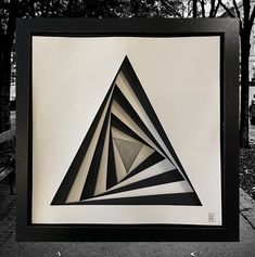 a black and white photo of a triangle