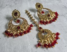 We are thrilled to introduce our exquisite collection of Indian earrings in Maroon color. These stunning earrings are crafted to enhance your style, whether you're attending a party or a wedding ceremony. They are guaranteed to make you stand out in the crowd.Elevate your style with these stunning Earrings. Make a bold fashion statement and turn heads wherever you go. Shop our stunning collection today!We have a wide range of colors available, so be sure to check our other listings to find the perfect match for your style. In addition to this earring, we have a wide variety of Indian Pakistani jewelry. Explore our shop to discover the perfect piece for your collection. If you're having trouble viewing our photos, try increasing your screen brightness for a clearer image.We aim to dispatch Maroon Earrings, Pakistani Style, Earrings Indian, Pakistani Jewelry, Indian Earrings, Bespoke Jewellery, Maroon Color, Stunning Earrings, Etsy Earrings Dangle