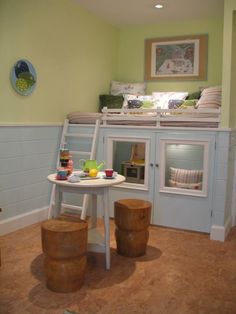 an image of a room with bunk beds and furniture on the floor in front of it