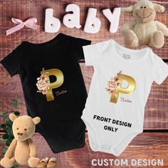 Custom Gold letter designed baby romper jumpsuit tshirt shirt design logo toddler. Chose your letter and add the name that you wish to use for this design. sizes 3m to 24 month available in black or white only  Fully customisable design on your babies romper shirt, if you are after a different design please don't hesitate to contact us and we will design something for your individual needs. Front design ONLY This shirt, romper is a custom design so please message us directly a photo or design th Family Matching Short Sleeve Onesie With Name Print, Birthday Bodysuit With Name Print And Short Sleeves, White Letter Print Bodysuit As Gift, Family Matching Birthday Bodysuit With Letter Print, Family Matching Onesie With Letter Print As Gift, Family Matching Letter Print Onesie Gift, Family Matching Onesie With Letter Print, Mother's Day White Letter Print Bodysuit, Short Sleeve Bodysuit With Name Print For Gifts