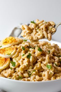 macaroni salad with hard boiled eggs and parsley