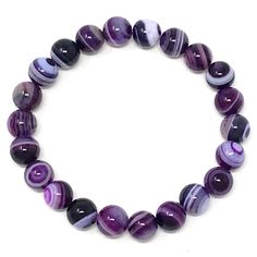 Precious looking black onyx & purple striped agate gemstones bracelets with a platinum plated purple bead• elegant, simple and meaningful! Black Onyx absorbs and transforms negative energy, and helps to prevent the drain of personal energy. Black Onyx aids the development of emotional and physical strength and stamina, especially when support is needed during times of stress, confusion or grief. The 2 piece set includes: 1x 8mm black onyx bracelet 1x 8mm purple striped agate bracelet ** the Gemstones Bracelets, Peach Aventurine, Physical Strength, Personal Energy, Black Onyx Bracelet, Jasper Bracelet, Purple Agate, Necklace Design, Onyx Bracelet