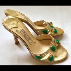 Beautiful And Classy Jimmy Choo Slip On Sandals With Unique Green Stone Designs, Definite Wear With A Black Cocktail Dress Or Black Suit! Green Slip-on Sandals For Party, Jimmy Choo Gold, Green Stones, Slip On Sandals, Swag Shoes, Black Suit, Black Cocktail, Jimmy Choo Shoes, Stone Design