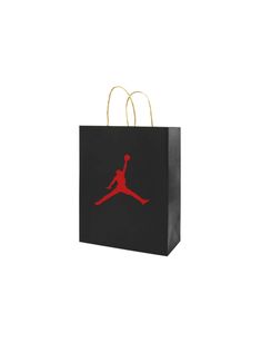 a black shopping bag with a red jordan logo on it