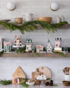 the shelves are decorated with christmas decorations