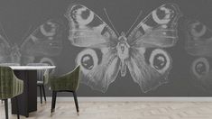 a dining room table with two chairs and a butterfly wall mural