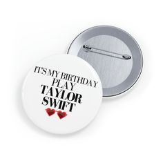 a button that says it's my birthday play taylor swift with two hearts on it