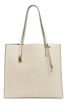 Carry your essentials in this chic pebbled leather tote bag by Marc Jacobs featuring a divider zip pocket to keep things organized..13.4' L x 12.4' H x 5.7' D.10' strap drop.Open top.Dual shoulder straps.Dual interior compartments with center zip-pocket divider.Leather.Imported.Item #6457537 Modern White Pebbled Leather Bag, White Pebbled Leather Bag With Adjustable Strap, White Textured Leather Bag For Work, White Shoulder Bag With Zipper For Work, White Textured Leather Work Bag, Pebbled Leather Tote Shoulder Bag With Zipper Closure, Pebbled Leather Tote Shoulder Bag With Zipper, Pebbled Leather Bags With Zipper Closure For Work, The Grind