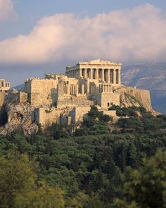 an ancient building on top of a mountain