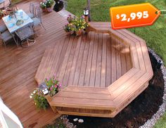 a wooden deck with flowers on it for $ 2, 995 per square foot