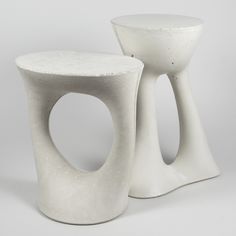 two white stools sitting next to each other