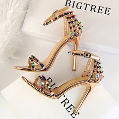 Brand Name: BIGTREEHeel Height: Super High (8cm-up)With Platforms: NoSandal Type: Modern SandalsOrigin: CN(Origin)Occasion: PartyUpper Material: PUOutsole Material: RubberBack Counter Type: Back StrapPattern Type: Mixed ColorsSide Vamp Type: OpenFit: Fits true to size, take your normal sizeStyle: sexyHeel Type: Thin HeelsLining Material: PUClosure Type: Buckle StrapModel Number: 267-2Item Type: SandalsFashion Element: RivetInsole Material: PUDepartment Name: Adult Hak Tinggi, Sandals Patterns, Modern Sandals, Roman Style, Gladiator Heels, Roman Fashion, Studded Sandals, Stiletto Sandals, Shoe Show