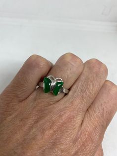 Vintage green nephrite jade Ornate German Silver ring, does not tarnish, NOT sterling Sizes 6.5, 7, or 7.5 All rings are shipped in a nice gift box. Check out our over a THOUSAND great reviews Engraving is $4 per letter and is not always perfect depending on the piece. It can take a few days if the jeweler is busy. This is payable to Paypal Judithsltd@gmail.com Formal Green Enamel Ring With Polished Finish, Green Hallmarked Enamel Ring For Anniversary, Hallmarked Green Enamel Ring For Anniversary, Green Enamel Ring With Polished Finish For Anniversary, Green Oval Enamel Ring For Formal Occasions, Jade Open Ring Gift, Green Oval Enamel Ring For Anniversary, Jade Open Ring As Gift, Jade Open Ring For Gift