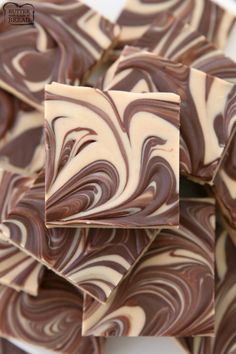 several pieces of chocolate and white swirled candy