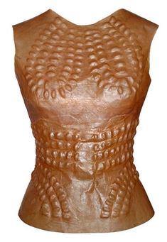 an image of a woman's torso made out of clay