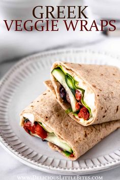 greek veggie wraps on a white plate with the title text overlay reads, greek veggie wraps