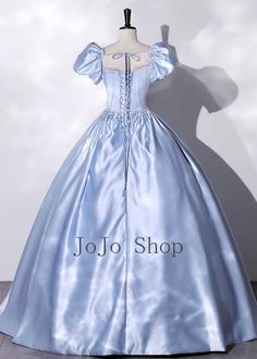 This beautiful pastel blue satin ball gown wedding dress is sure to enchant your guests. Featuring puff short sleeves, it provides a classic and elegant look worthy of any Cinderella-themed princess. The soft satin material is comfortable to wear and designed to last. Boning and bra padding Lace-up closure Floor length Ball Gown Petticoat recommended Princess Style Light Blue Ball Gown For Debutante Ball, Princess Style Blue Ball Gown For Formal Occasions, Blue Satin Ball Gown For Debutante Ball, Blue Satin Dress For Debutante Ball, Fitted Blue Satin Ball Gown, Blue Satin Prom Ball Gown, Blue Satin Ball Gown For Prom, Blue Satin Ball Gown For Wedding, Blue Satin Floor-length Ball Gown