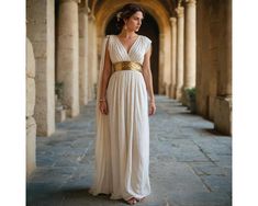 📍 This Renaissance-inspired Goddess toga combines the flowing elegance of ancient Greco-Roman attire with the opulence and artistry of the Renaissance period. The design is graceful and majestic, perfect for embodying the divine presence of a goddess. FEATURES: ◾ Material: Cotton PERSONALIZATION: Kindly provide your bare body sizes: - Cross Shoulder" - Sleeves" - Height" Greek Womens Dress, Greek Goddess Dress With Sleeves, Long Greek Goddess Dress, Viking Dress Woman Greek, Greek Goddess Dress Off Shoulder, Roman Night Dress, Roman Wedding Dress Egyptian, Modest Grecian Dress, Gods Gift To Women Costume