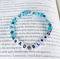 Add some bad blood to your wardrobe with the Bad Blood Bracelet! Inspired by Taylor Swift's 1989 album, this playful piece features eye-catching blue clay beads. A must-have for any Swiftie or stylish music fan. (Warning: may cause uncontrollable singing and dancing.) Bracelets are 7 inches, 7.5 are available upon request! I cannot change anything except the size! Colors May Vary! Adjustable Blue Kpop Bracelets, Bad Blood Bracelet, Taylor Swift Bracelet Ideas Clay Beads, Blood Bracelet, Taylor Swift Bad Blood, Harry Potter Necklace, Swift Bracelets, Bracelet Inspired, Blue Clay