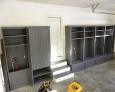 an empty room with shelves and tools in it