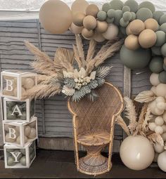 an arrangement of balloons and decorations for a baby shower