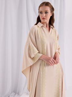 WF ATELIER Model height: 177 CM 100% Polyester Length : 140cm Elegant V-neck Relaxed Fit Shirt Dress, Elegant Oversized V-neck Maxi Dress, Elegant Short Sleeve Spring Kaftan, Elegant V-neck Formal Abaya, Elegant Oversized Abaya, Elegant Short Sleeve Dresses For Eid, Elegant Oversized Long Sleeve Maxi Dress, Elegant Summer Kurta In Maxi Length, Formal Long Sleeve Beige Kurta