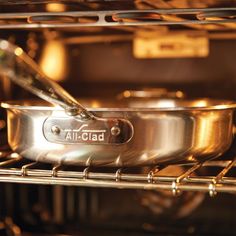 an all clad pan is cooking in the oven