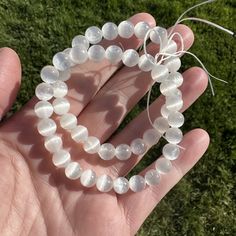 Stunning flashy white selenite satin spar bracelets with shining 8mm beads! Wear it proudly, or craft your own using the beads! About 8" around. White Spiritual Faceted Beads Bracelet, Selenite Crystal Jewelry, Selenite Bracelet, White 8mm Healing Beads, White Faceted Spiritual Beads, Wholesale Crystals, 8mm Beads, Idaho Falls, Wear It