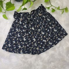 American Eagle Black Floral Print Flowy Pull On Shorts With A Belt Tie. High Rise. Brand New With Tags. Size Small Approximate Flat Measurements: Waist - 12.5" Unstretched, 14" Stretched Rise - 12" Inseam - 2.5" Black Floral Print Vacation Bottoms, Vacation Black Floral Print Bottoms, Black Shorts With Elastic Waistband For Day Out, Black Bottoms With Floral Print For Spring, Black Spring Season Shorts, Black Bottoms With Short Inseam For Vacation, Black Floral Print Bottoms For Summer, Black Vacation Shorts For Spring, Black Shorts For Spring Vacation