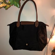 Longchamp Classic Black Bag I Bought This Bag Probably Around 2015 So I Lost The Receipt For It. Its Been Used Very Much But Is Durable. I Bought This In The Nyc Soho Location. There Are No Stains Or Tears Though And I Believe Its The Medium Size Bag #Longchamp Classic Black Shoulder Bag With Leather Trim, Black Shoulder Bag With Leather Trim For Daily Use, Black Shoulder Bag With Leather Trim, Black Leather Trim Shoulder Bag For Shopping, Black Shoulder Bag With Leather Trim For Errands, Black Travel Bag With Snap Closure, Black Leather Shoulder Bag For Daily Use, Black Bags With Snap Closure For Errands, Black Shoulder Bag With Snap Closure For Errands