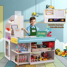 a young boy standing in front of a toy store counter