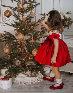 Elegant Christmas Dresses With Ruffles, Elegant Festive Holiday Dress With Ruffles, Elegant Christmas Satin Dress, Elegant Satin Christmas Dress, Red Satin Dress With Ruffles, Red Satin Ruffled Dress, Red Holiday Dress With Red Bow, Holiday Red Dresses With Red Bow, Red Satin Holiday Dress