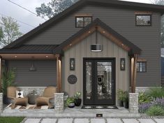 the front entrance to a house with two chairs