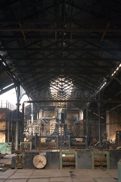 the inside of an old factory with machinery and other items in it royalty images, stock photos