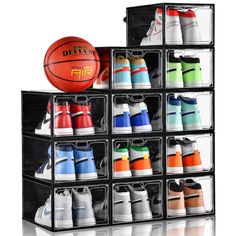 several clear bins with different colored shoes and a basketball on top in front of a white background